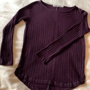 Cozy long sleeved knit top.